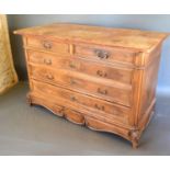 A 19th Century French Commode with two short and three long drawers with brass handles and