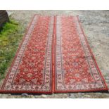 A Pair of Machine Made Woollen North West Persian Style Runners with an all over design upon a red