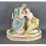 A Late 19th Century Meissen Porcelain Large Group in the form of Venus clipping the wings of Cupid