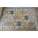 A North West Persian Style Woollen Large Rug with three rows of guls within an all over design