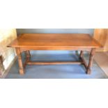 A Green Oak Large Refectory Dining Table, the plank top above a plain frieze raised upon turned legs