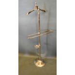 A Chromium Valet Stand with circular stepped base, 145 cms tall