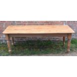 A Pine Refectory Style Farmhouse Kitchen Table, the plank top above turned tapering legs, 210 x 76