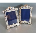 A Pair of 925 Silver Photograph Frames of embossed shaped form, 21 x 15 cms