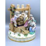 A Late 19th Century Meissen Porcelain Group in the form of six figures around a wine press decorated