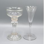 An Early Glass of fluted form with circular foot, 17 cms tall together with another early glass with