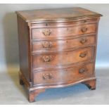 A Reproduction Mahogany Serpentine Fronted Chest of Drawers, the moulded top above a brushing
