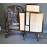 A Victorian Mahogany Cheval Mirror, the shaped arched mirror with shaped scroll supports upon a