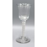 An Early Cordial Glass Mixed Air and Cotton Twist and with circular foot, 15 cms tall