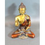 A Chinese Patinated Bronze Figure in the form of a Seated Buddha 19 cms tall