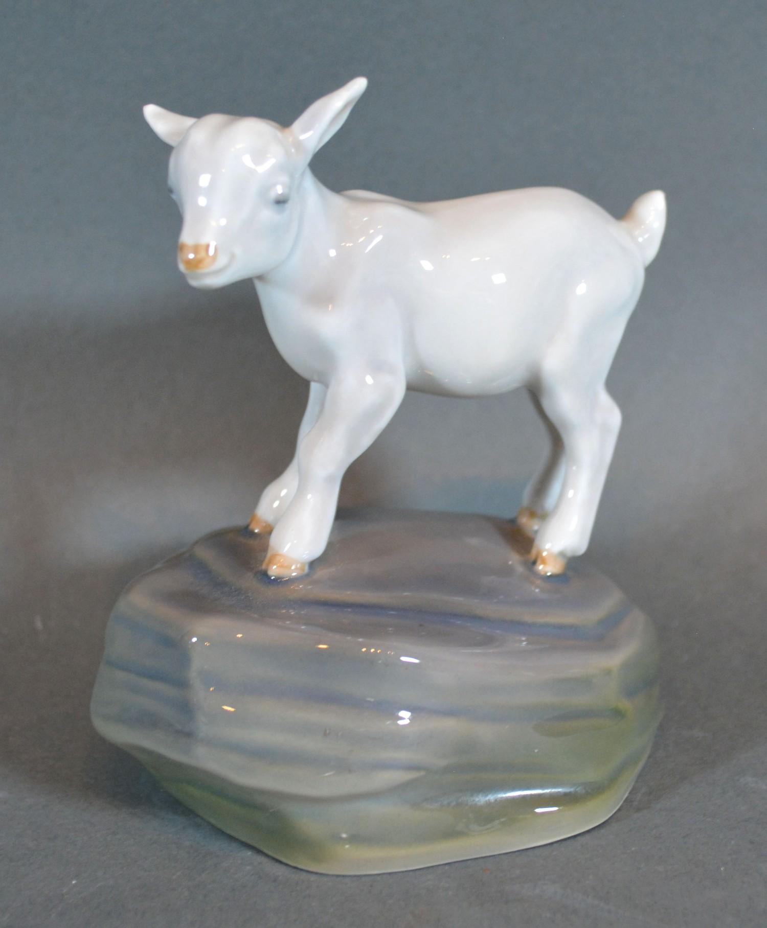 A Royal Copenhagen Model of a Lamb upon a Rock, 10 cms tall