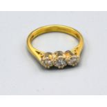 An 18ct. Gold Three Stone Diamond Ring claw set, 3.2 gms ring size L