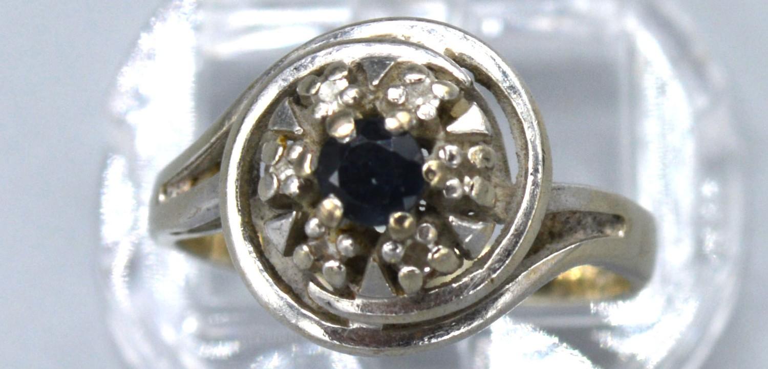 A 14ct. White Gold Diamond and Sapphire Cluster Ring with a central sapphire surrounded by diamonds, - Image 2 of 2