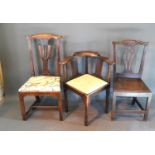 A George III Oak Corner Armchair together with two similar Chippendale style side chairs