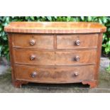 A Victorian Mahogany Bow Fronted Chest of two short and two long drawers with knob handles raised