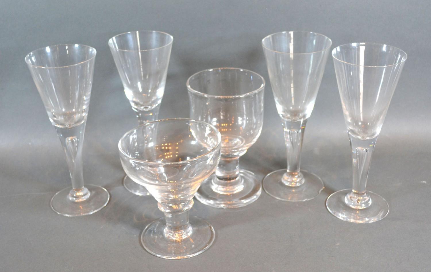 A Set of Four Glass Champagne Flutes together with two early rummers