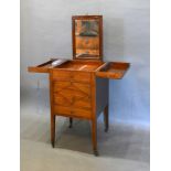 A Georgian Mahogany Washstand, the double hinged top enclosing a pull-up mirror above an inlaid