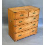 A Campaign Style Chest of two short and three long drawers with sunken brass handles and brass