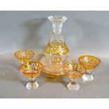 A Victorian Glass Drinking Set comprising a decanter and four small glasses engraved with foliate