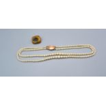 A Cultured Pearl Double Row Necklace with yellow metal oval clasp together with a citrine set brooch