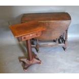 A 19th Century Mahogany Work Table, the frieze drawer above an octagonal column and platform base