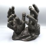 Gustinus Ambrosi A Patinated Bronze Sculpture in the form of Two Hands, signed and dated