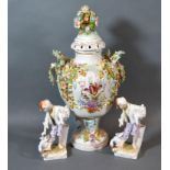 A Sitzendorf Porcelain Covered Vase encrusted with flowers and foliage and with painted decoration