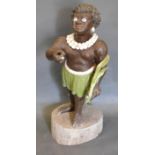 A Blackamoor Figure with circular pedestal base, 93 cms tall