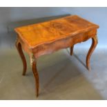 A Walnut Marquetry Inlaid and Gilt Metal Mounted Card Table, the hinged top above a shaped frieze