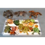 A Patinated Bronze Model of a Frog together with other similar models of frogs