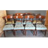 A Set of Five Victorian Mahogany Dining Chairs with rail backs above stuff over seats raised upon
