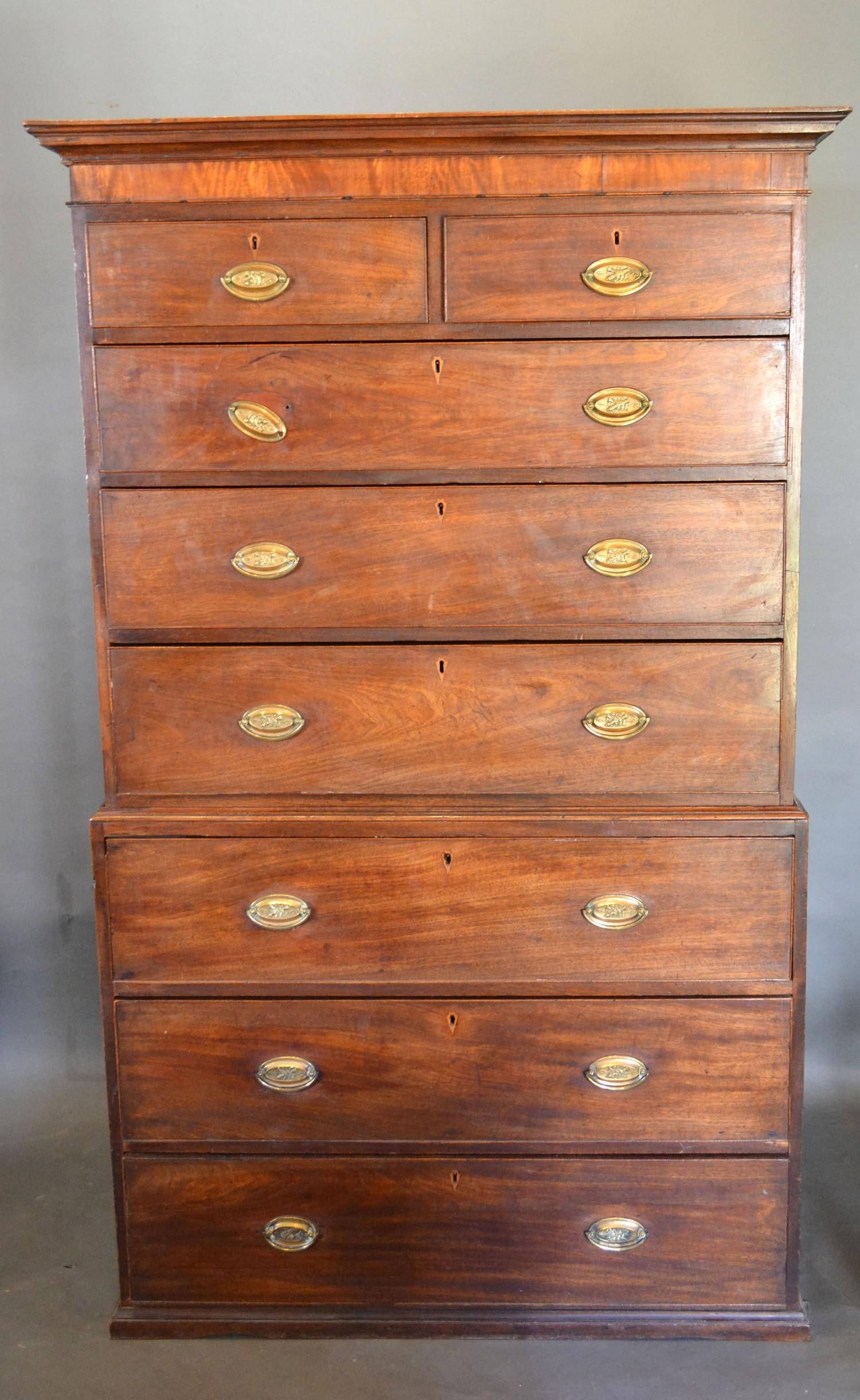 A George III Mahogany Chest on Chest, the moulded cornice above two short and six long graduated