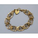 A 9ct. Gold Gatelink Bracelet with heart shape padlock clasp, 6.9 gms