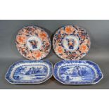 An Early 19th Century Underglaze Blue Decorated Platter together with another similar and a pair