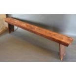 A Long Pine Bench with Twin End Supports, 213 cms x 22 cms, 48 cms high