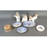 A Group of Three Lladro Figurines of Angels together with four Royal Copenhagen Dishes and a