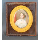 An Early 19th Century Portrait Miniature 'Study Of A Girl In Period Dress' within oval frame 13 x 10