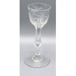 An Early Engraved Tulip Shaped Cordial Glass with cut stem and circular foot, 15 cms tall