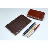 A Crocodile Skin Wallet with 9ct. Gold Corner Mounts retailed by Mappin & Webb, together with