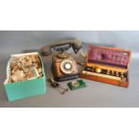 An Early Copper and Bakelite Telephone together with other items to include a cased hydrometer and a