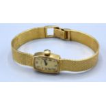A 14ct Gold Cased Ladies Wrist Watch by Movado 19.2 gms excluding movement and glass