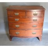 A 19th Century Mahogany Bow Fronted Chest of two short and three long drawers raised upon bracket