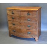 A Victorian Mahogany Bow Fronted Chest of Drawers, the moulded top above two short and three long