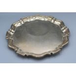 A George V Silver Salver of shaped outline, Sheffield 1922, 21 ozs. 30 cms diameter