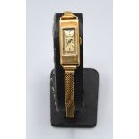 A Rolex 9ct Gold Cased Ladies Wrist Watch with 9ct gold linked strap 14.6 gms
