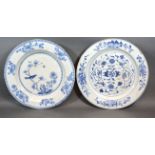 A Late 18th Early 19th Century Chinese Circular Charger decorated in underglaze blue together with