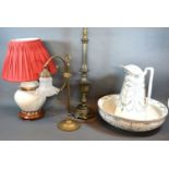 A Brass Adjustable Table Lamp with opaque glass shade together with two other table lamps and a