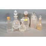 A Cut Glass Decanter with Birmingham Silver Collar together with five other glass decanters