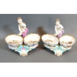 A Pair of Late 19th Early 20th Century Berlin Porcelain Double Salts each with putti surmount