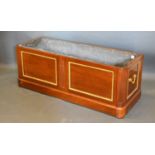 A French Mahogany and Gilt Metal Mounted Planter of rectangular form with a two panel front and